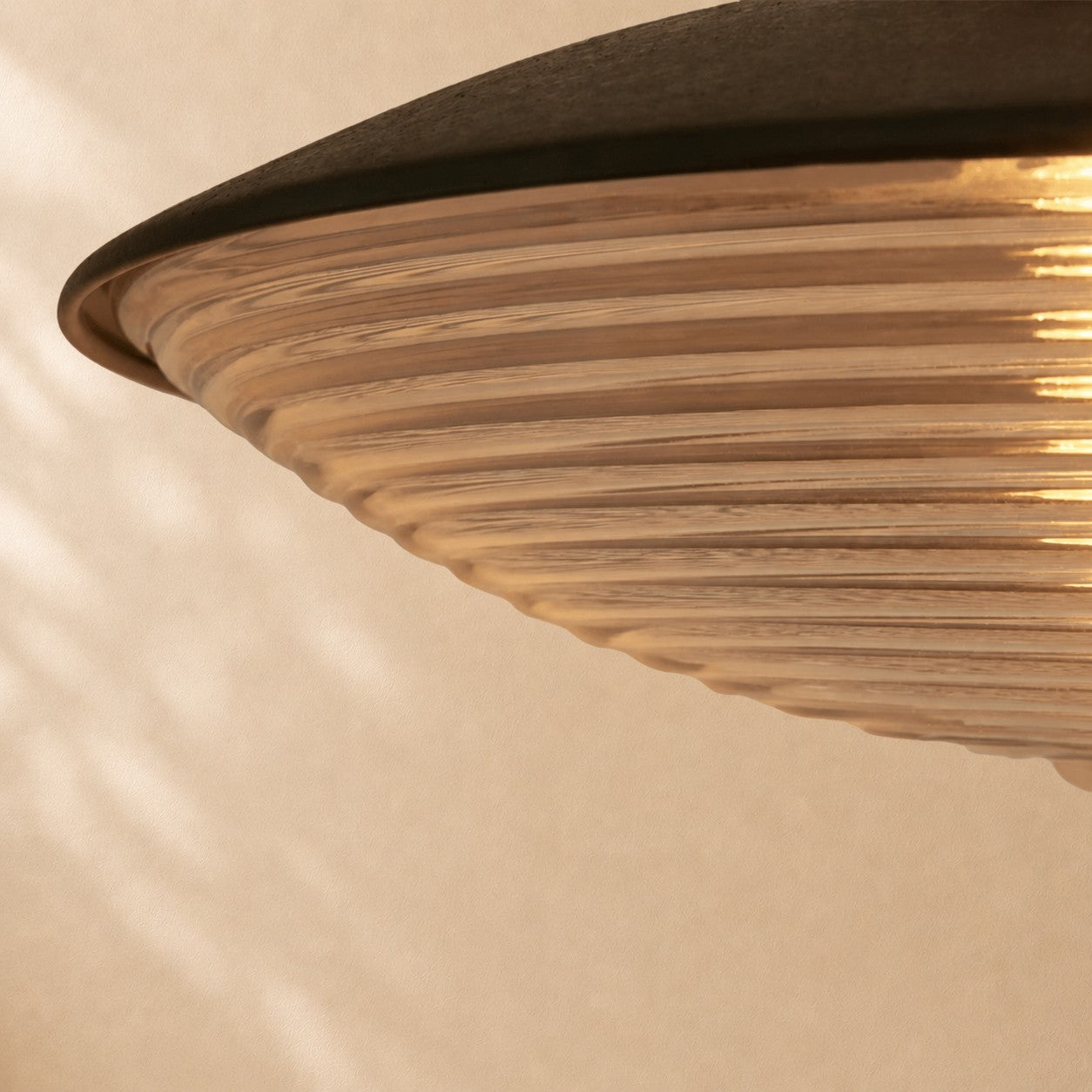 Cedric Blackened Iron Ribbed Glass Outdoor Sconce