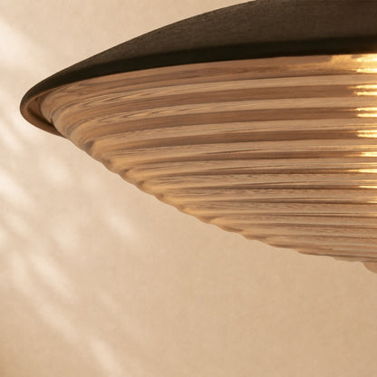 Cedric Blackened Iron Ribbed Glass Outdoor Sconce